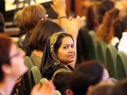 Migrants and refugees enjoying a cultural activity